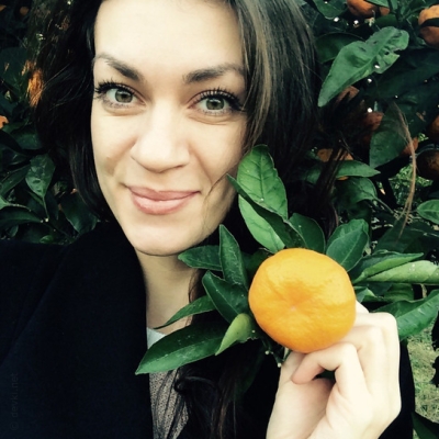 A smiling mature lady showed off her naked body with pleasure