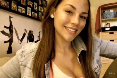 Cute girl takes a selfie in the shower