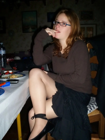 Red-haired girl sucks a guy's dick and shows her hairy pussy