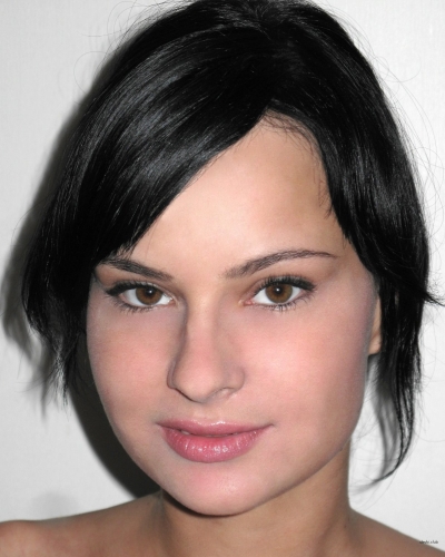 Photo of a positive naked brunette