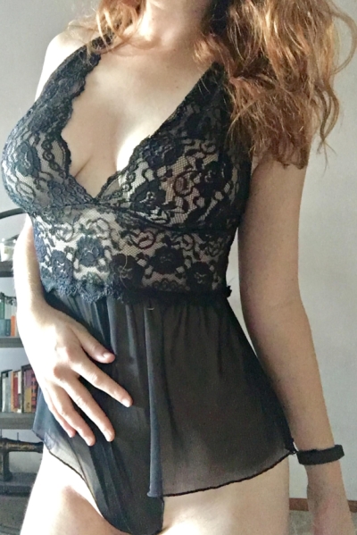 Sexy redheaded wife beautifies herself in different erotic outfits