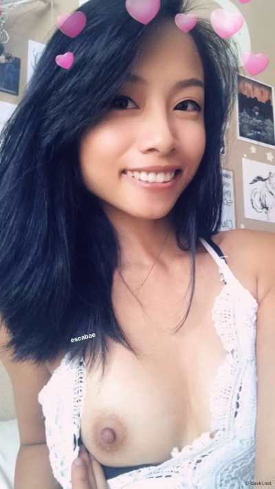 Naked Japanese girl takes a selfie — close-up of her firm butt