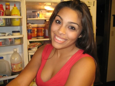 A big-lipped mulatto sucks a guy's dick