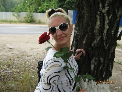 Two naked girlfriends are having fun without clothes at a party