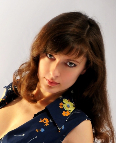 A beautiful lady took several candid photos for herself.