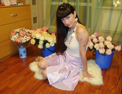 Cute slim girl photographed at home in nude style