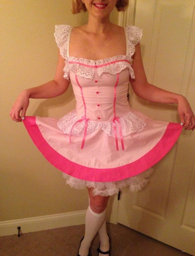 Blonde in a dress masturbates pussy